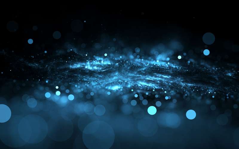 Blue illustration of particles of radiation